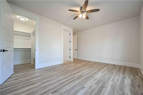 a living room with furniture and windows