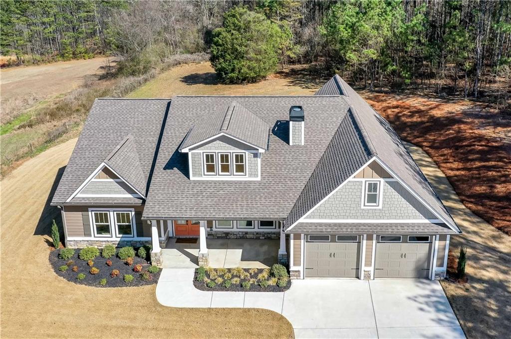 3667 Jones Mill Road Carrollton, GA 30116 - Photo 3 of 66 a front view of a house with a yard