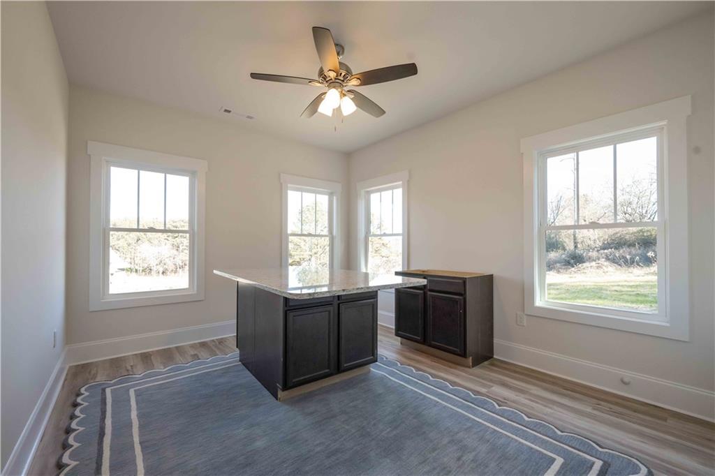 3667 Jones Mill Road Carrollton, GA 30116 - Photo 35 of 66 a living room with furniture and windows