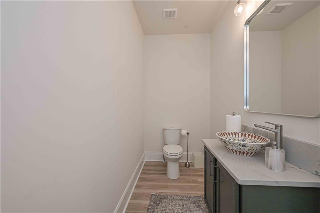 3667 Jones Mill Road Carrollton, GA 30116 - Photo 43 of 66 a bathroom with a sink and a toilet