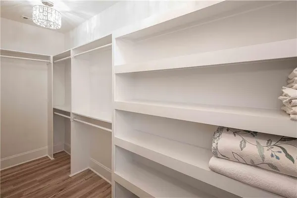 a view of an entryway with a floor to ceiling window