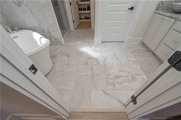 a view of a house with a street