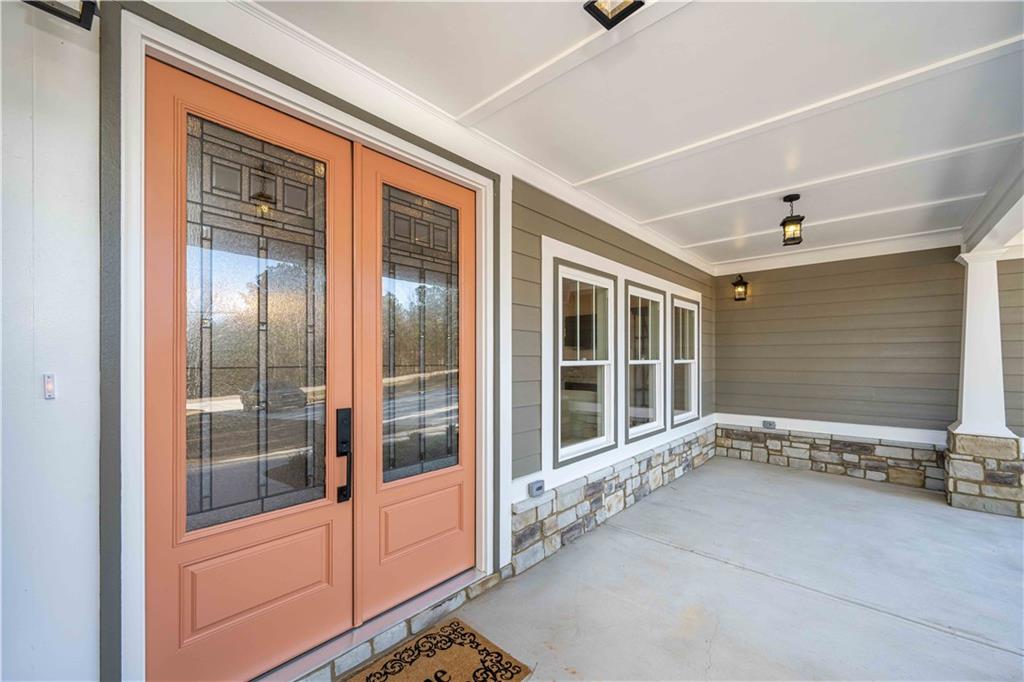 3667 Jones Mill Road Carrollton, GA 30116 - Photo 60 of 66 a view of an entryway with a floor to ceiling window