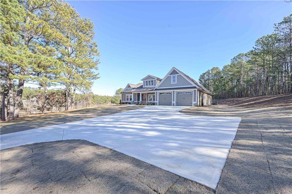 3667 Jones Mill Road Carrollton, GA 30116 - Photo 62 of 66 a view of a house with a street