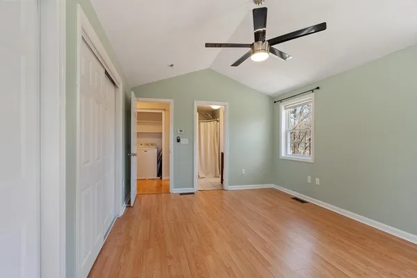 a view of a livingroom with wooden floor