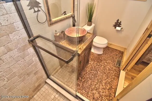 a kitchen with a stove a sink and a microwave