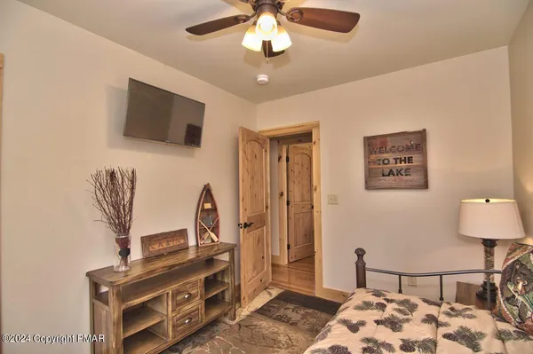 a view of a livingroom with furniture and chandelier