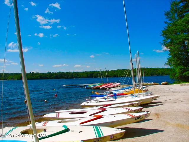 a view of a lake with a big yard