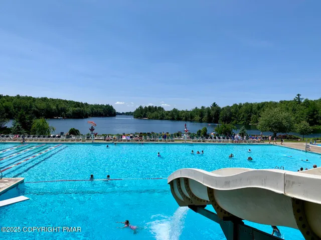 a view of a house with a big yard