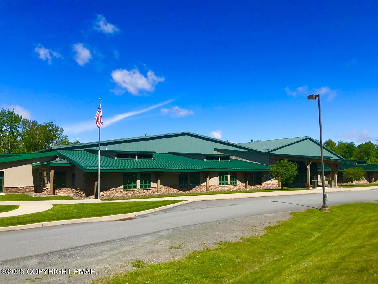 5187 Woodland Avenue Pocono Pines, PA 18350 - Photo 36 of 40 a view of a house with a big yard