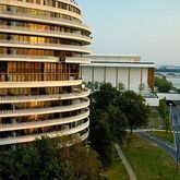 a view of a large building with a yard