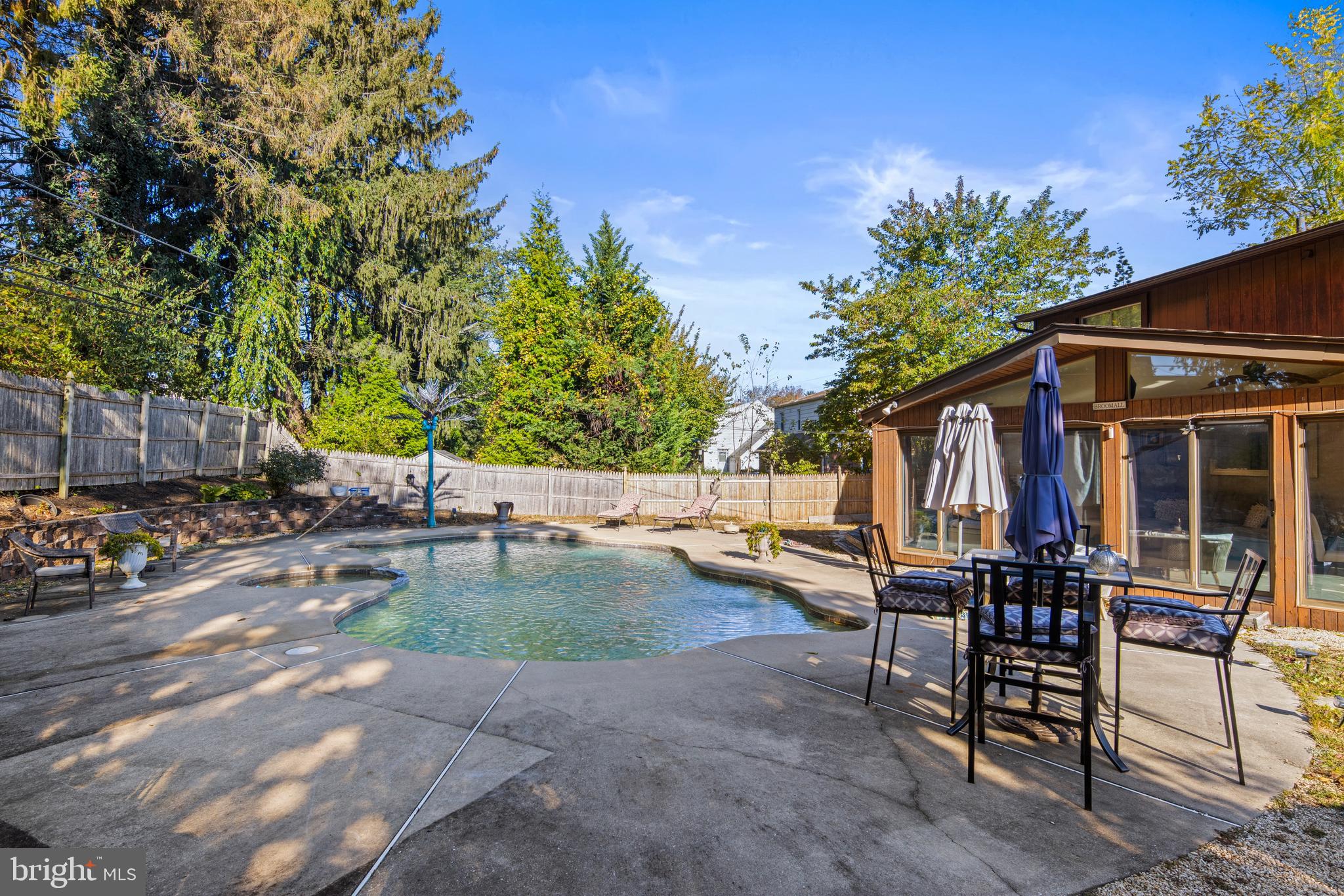 2606 Springfield Road Broomall, PA 19008 - Photo 28 of 32 a backyard of a house with table and chairs