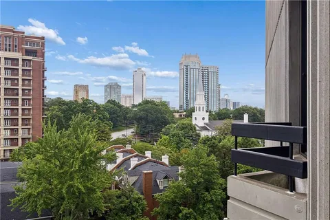 a view of a city with tall buildings