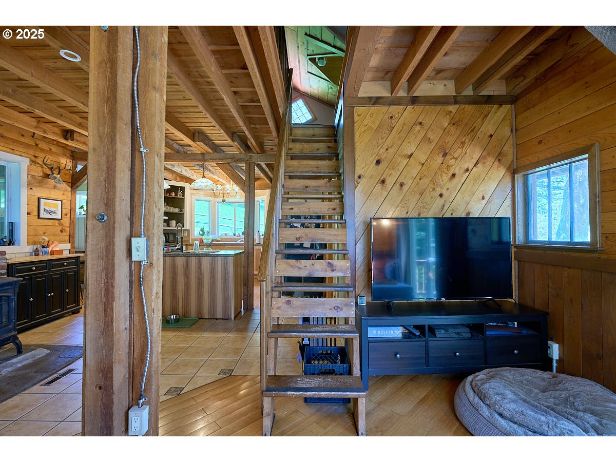 83863 Ollokot Lane Joseph, OR 97846 - Photo 12 of 25 a living room with furniture and a flat screen tv