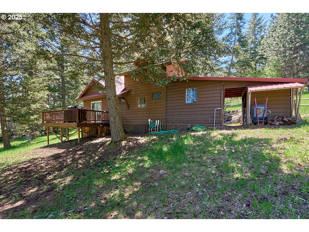 83863 Ollokot Lane Joseph, OR 97846 - Photo 15 of 25 a front view of a house with garden