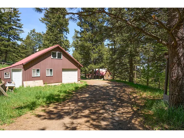 a view of a garage with an bike and chair