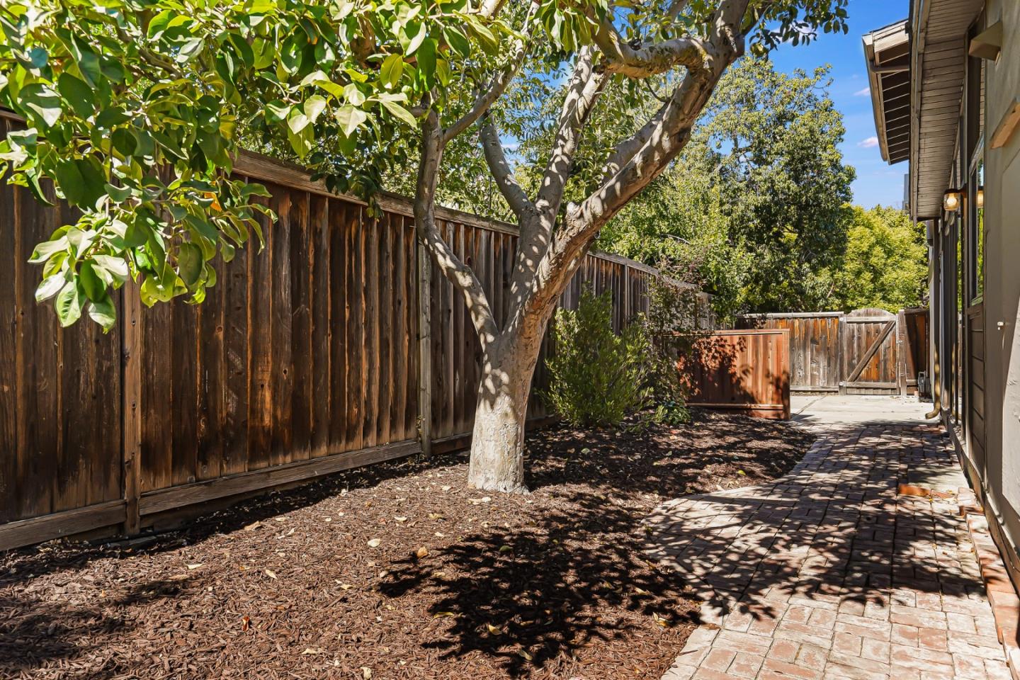 3955 Bibbits Drive Palo Alto, CA 94303 - Photo 39 of 42 a backyard of a house with lots of green space