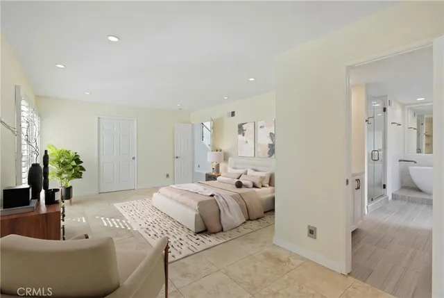 a view of a room with an empty space and a window