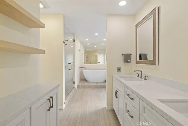 a bathroom with a bathtub and shower