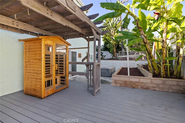 a view of a porch with wooden floor