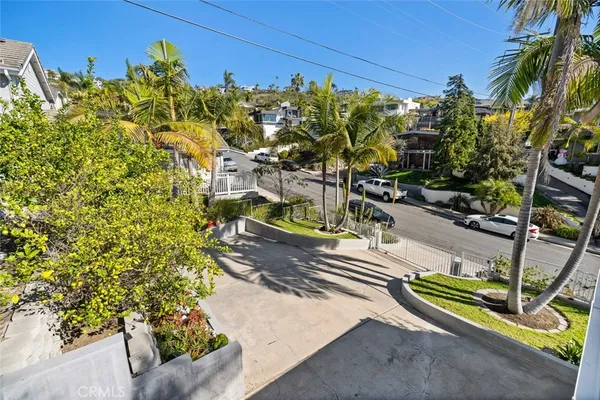 a view of a backyard with plants