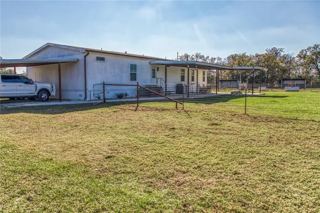 a childrens park with lots of swings and slides