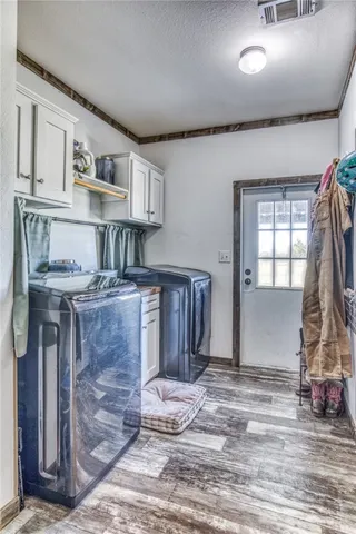 a swimming pool with outdoor seating and yard