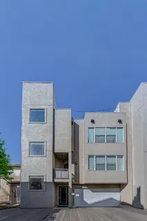 a front view of a house with a garage