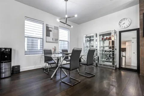 a view of a chairs in back side of the house