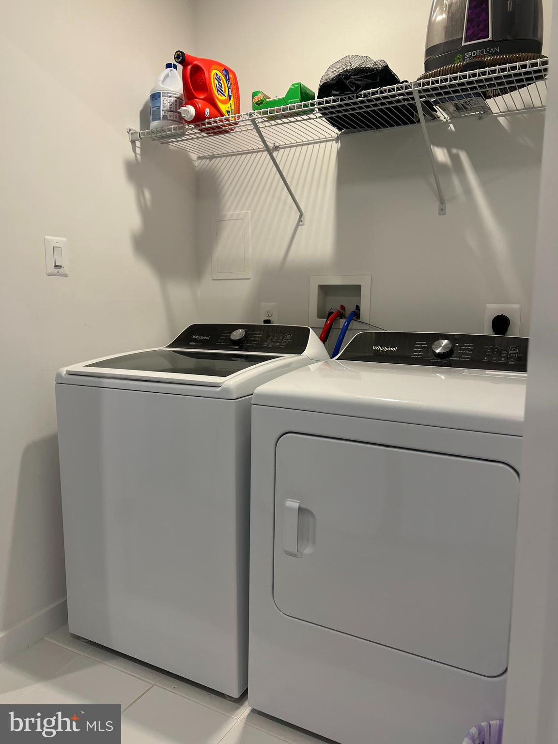 738-7 Tatum Court Frederick, MD 21702 - Photo 15 of 19 a utility room with dryer and washer
