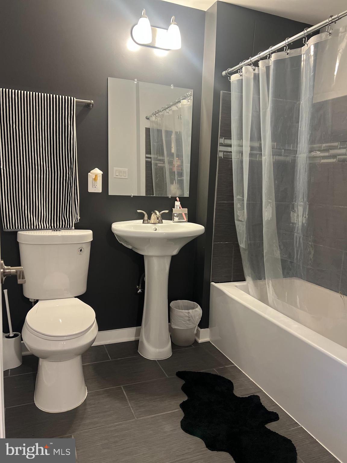 738-7 Tatum Court Frederick, MD 21702 - Photo 18 of 19 a bathroom with a sink toilet and shower