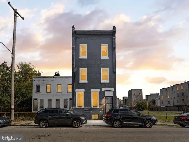 a car parked in front of a building