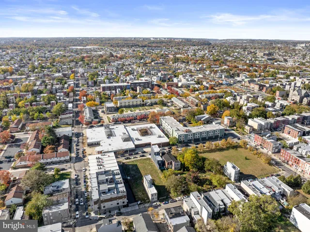 a aerial view of a house with a swimming pool