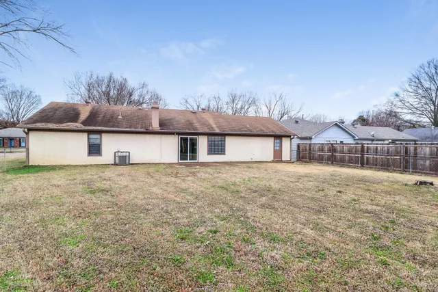a house view with a garden space