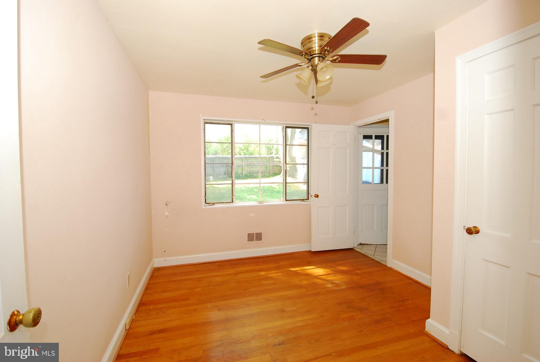 11614 Veirs Mill Road Silver Spring, MD 20902 - Photo 3 of 26 Great bedroom or den next to kitchen!
