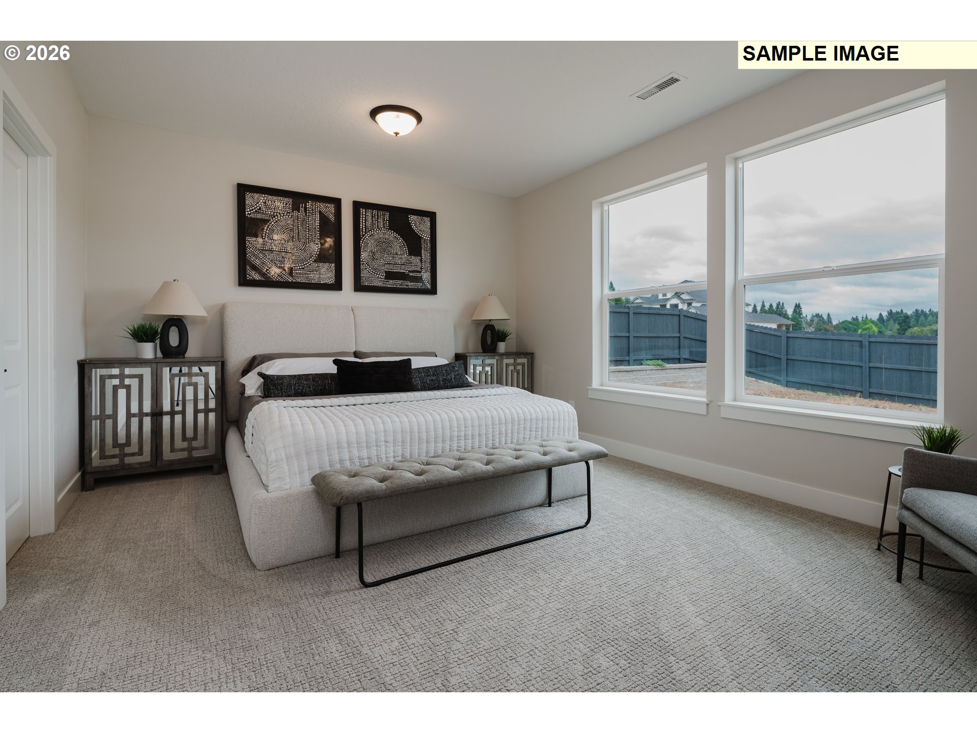 1403 North 41st Place Ridgefield, WA 98642 - Photo 17 of 30 a bedroom with a large bed and a window