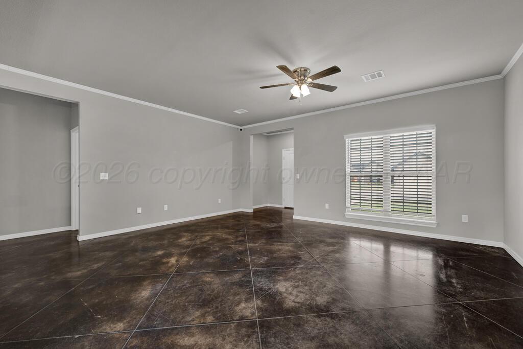 9919 Addelyn Avenue Amarillo, TX 79119 - Photo 6 of 23 a view of an empty room with a window