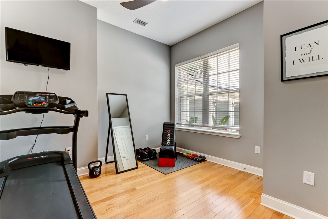 96266 Dowling Drive Yulee, FL 32097 - Photo 16 of 35 a view of a room with gym equipment