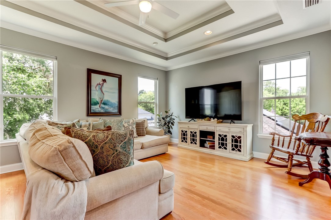 96266 Dowling Drive Yulee, FL 32097 - Photo 18 of 35 a living room with furniture and a flat screen tv