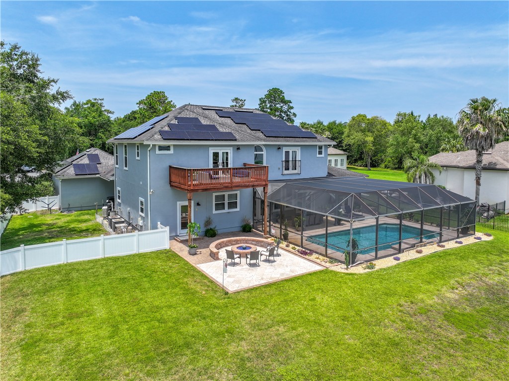 96266 Dowling Drive Yulee, FL 32097 - Photo 25 of 35 a view of a house with a garden
