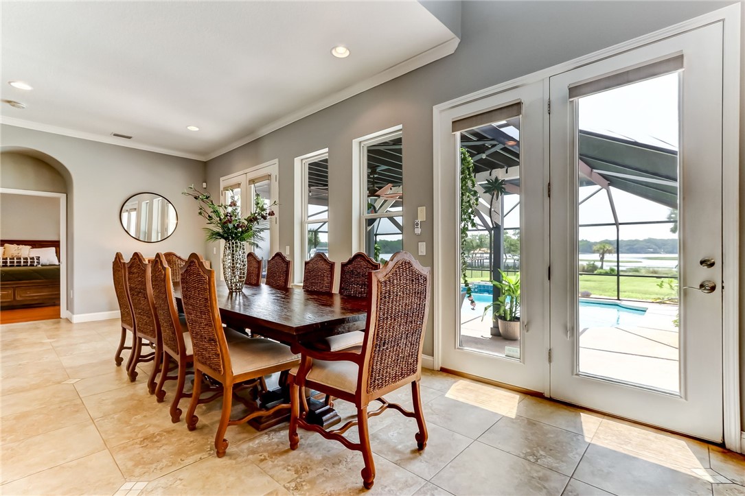 96266 Dowling Drive Yulee, FL 32097 - Photo 8 of 35 a view of a dining room with furniture window and outside view