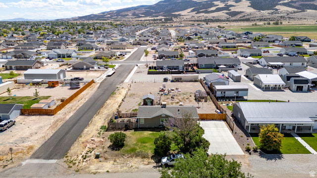 4296 Maple Lane Cedar City, UT 84721 - Photo 37 of 44 Aerial perspective showcasing a residential neighborhood with mountain backdrop