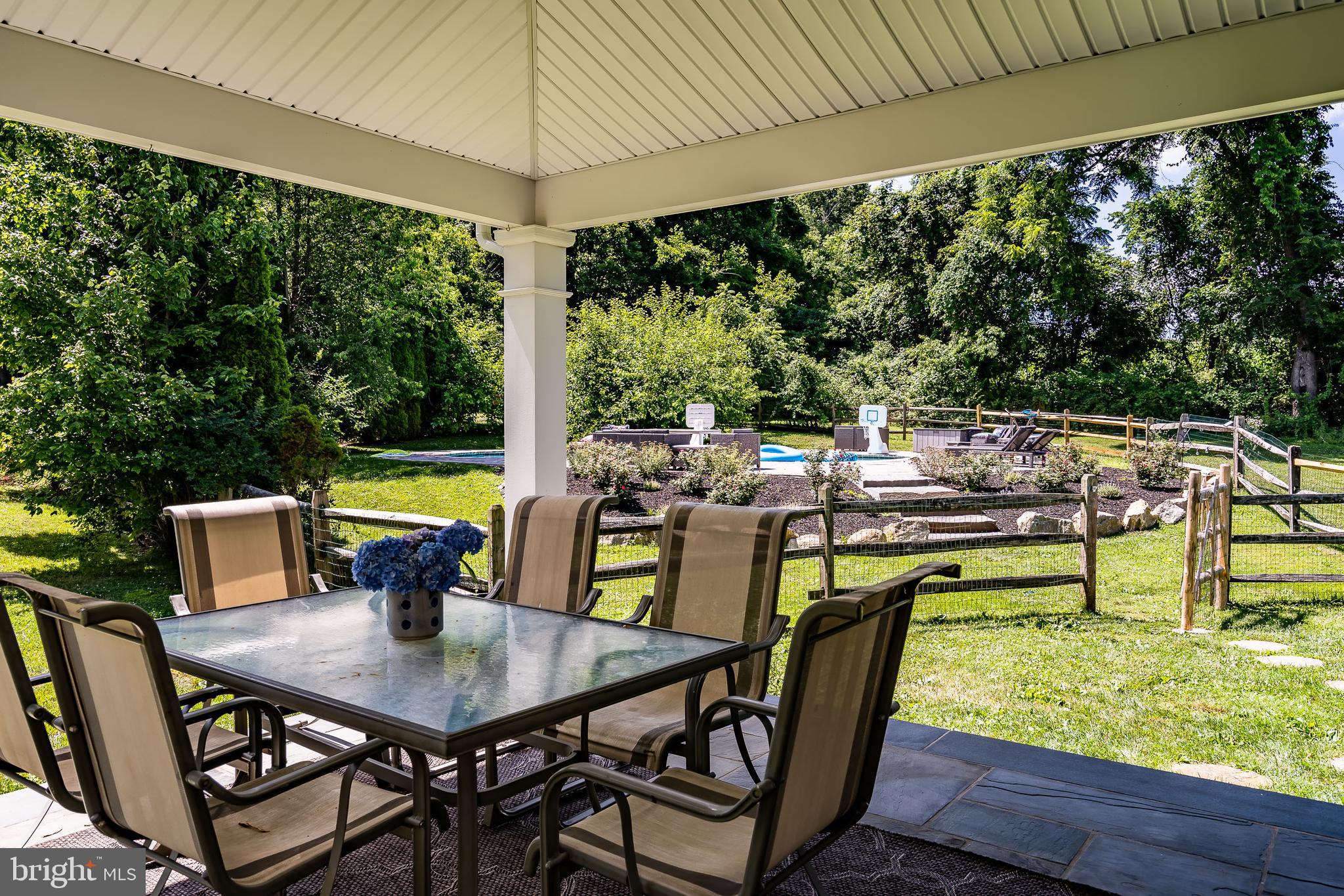 13 College View Road Malvern, PA 19355 - Photo 48 of 74 Covered patio looks over the pool
