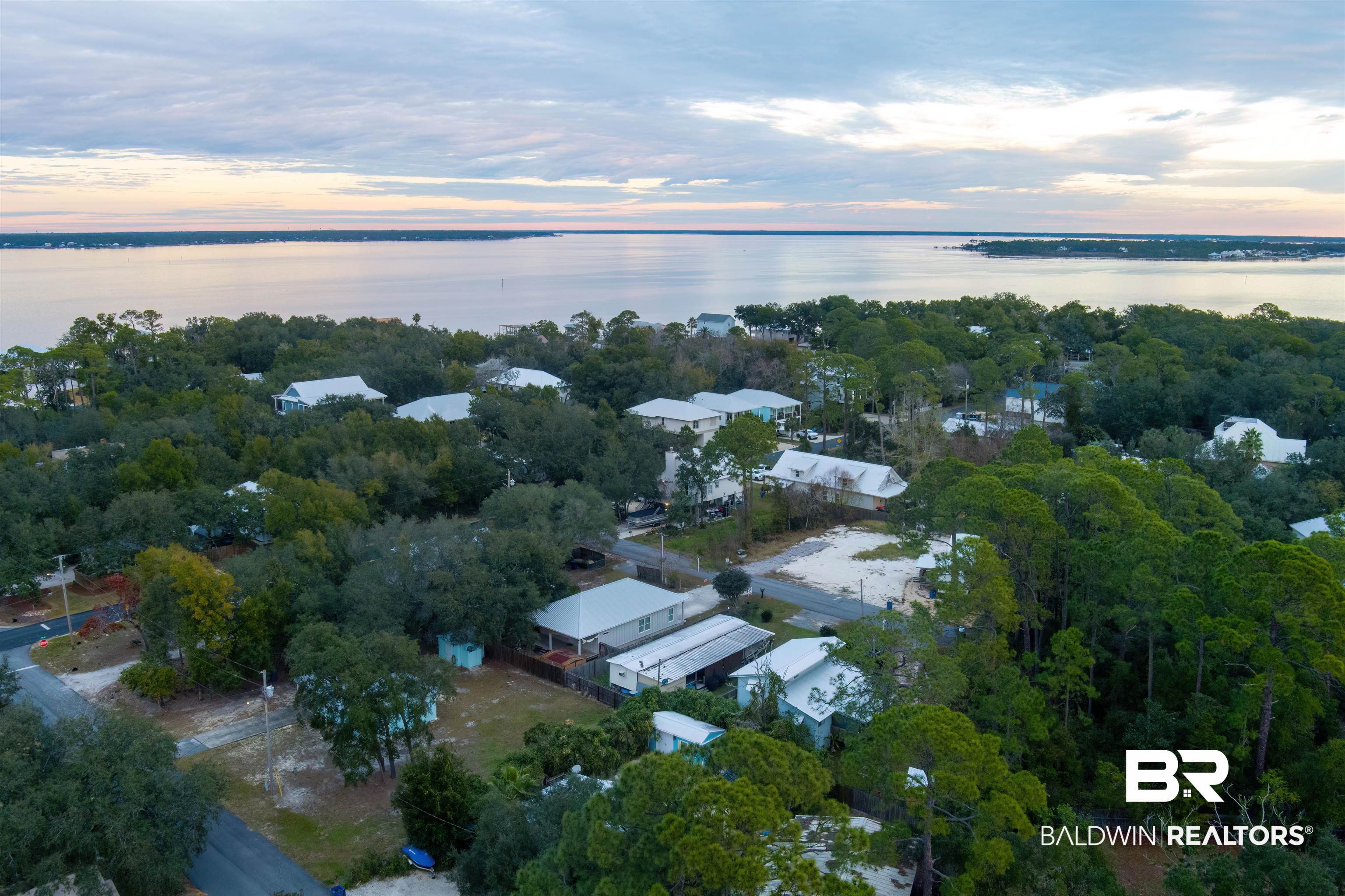 5625 Georgia Street Orange Beach, AL 36561 - Photo 29 of 30 Aerial view at dusk featuring a water view
