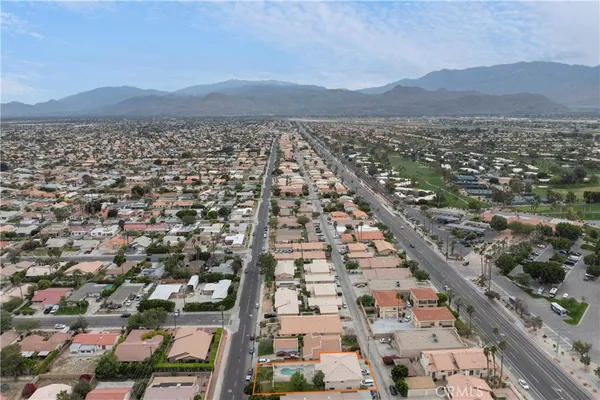 an aerial view of residential building and lake view