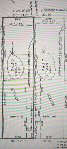 a view of a yard with a house