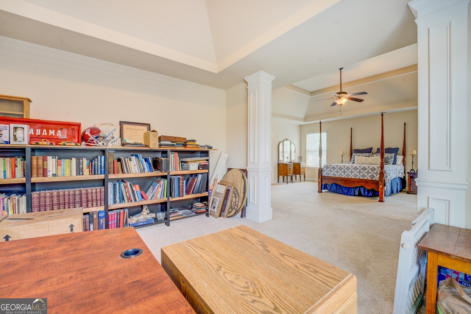 312 Relative Trail McDonough, GA 30253 - Photo 32 of 54 a living room with lots of book furniture and a book shelf