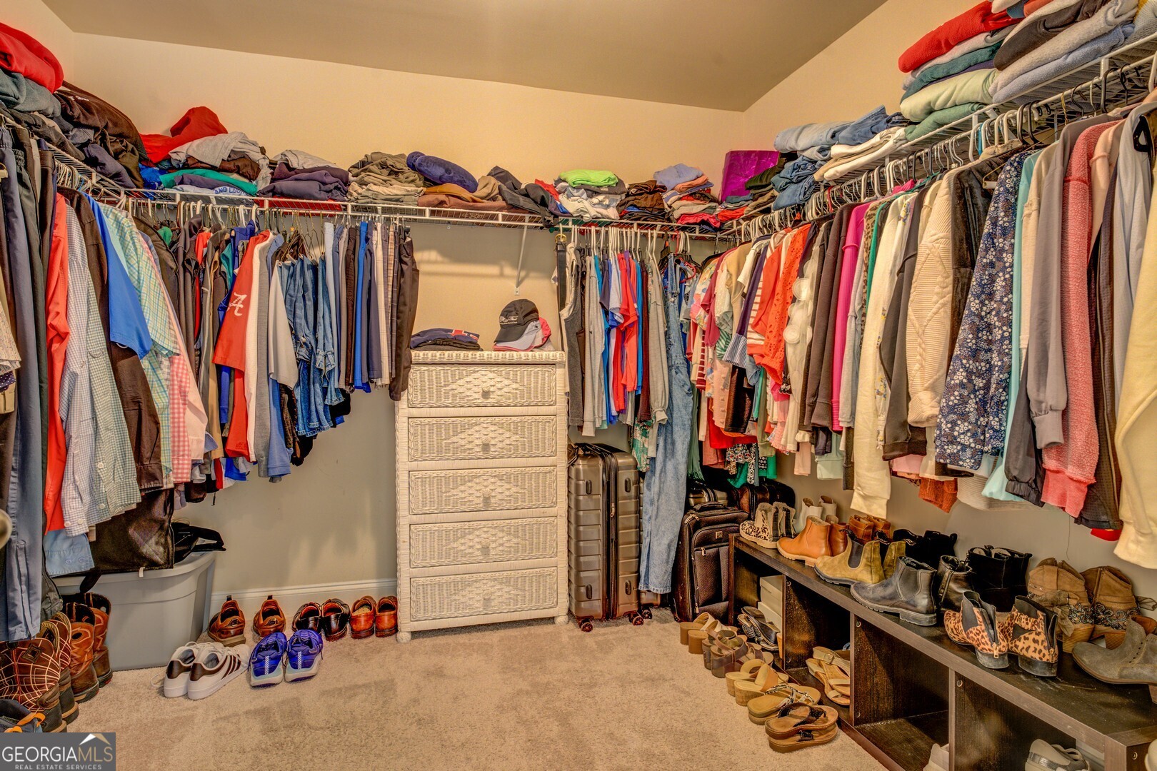312 Relative Trail McDonough, GA 30253 - Photo 36 of 54 a view of walk in closet with clothes