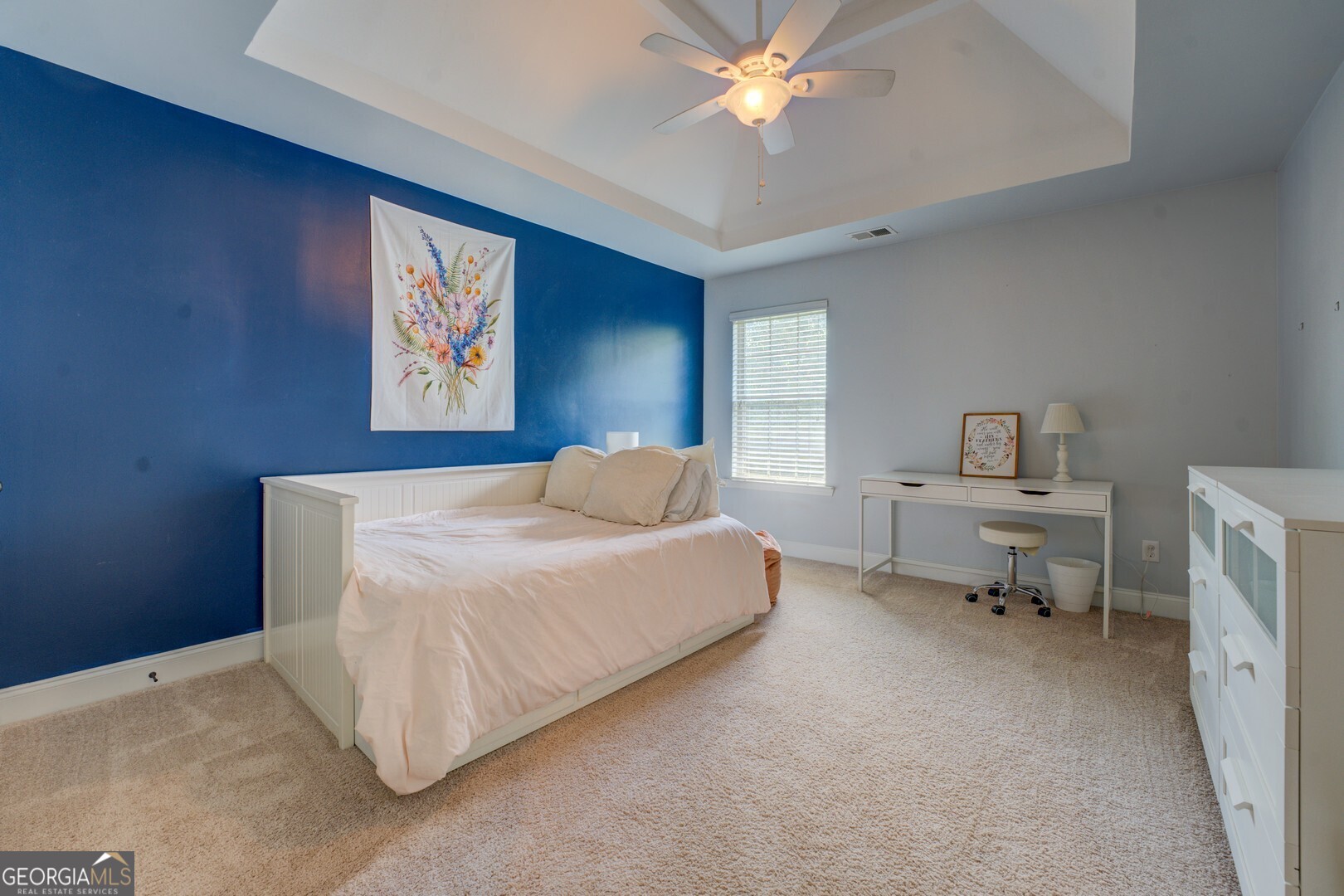 312 Relative Trail McDonough, GA 30253 - Photo 41 of 54 a bedroom with a bed and a chandelier