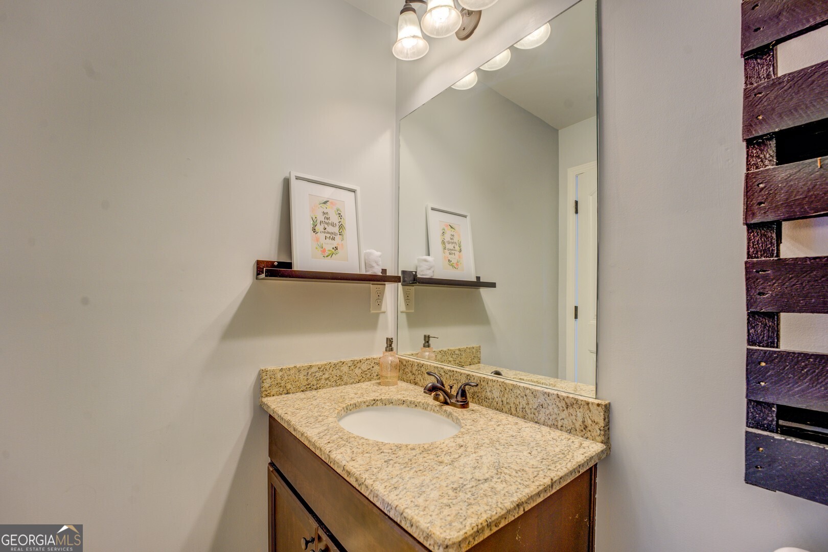 312 Relative Trail McDonough, GA 30253 - Photo 42 of 54 a bathroom with a granite countertop sink and a mirror